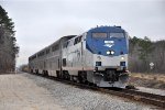 Westbound "Texas Eagle" passes manifest in siding